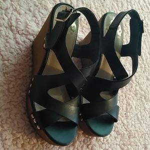 Fergalicious black wedge sandals with gold studs.